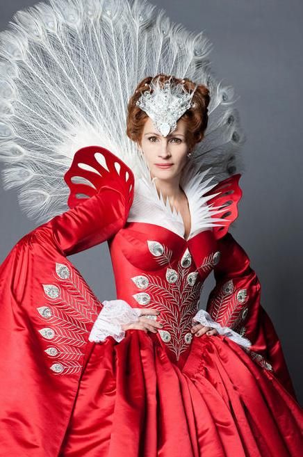 Julia Roberts stars in Mirror Mirror - 2012 . Adorned in White Bleached and Dyed Peacock Tail Feathers